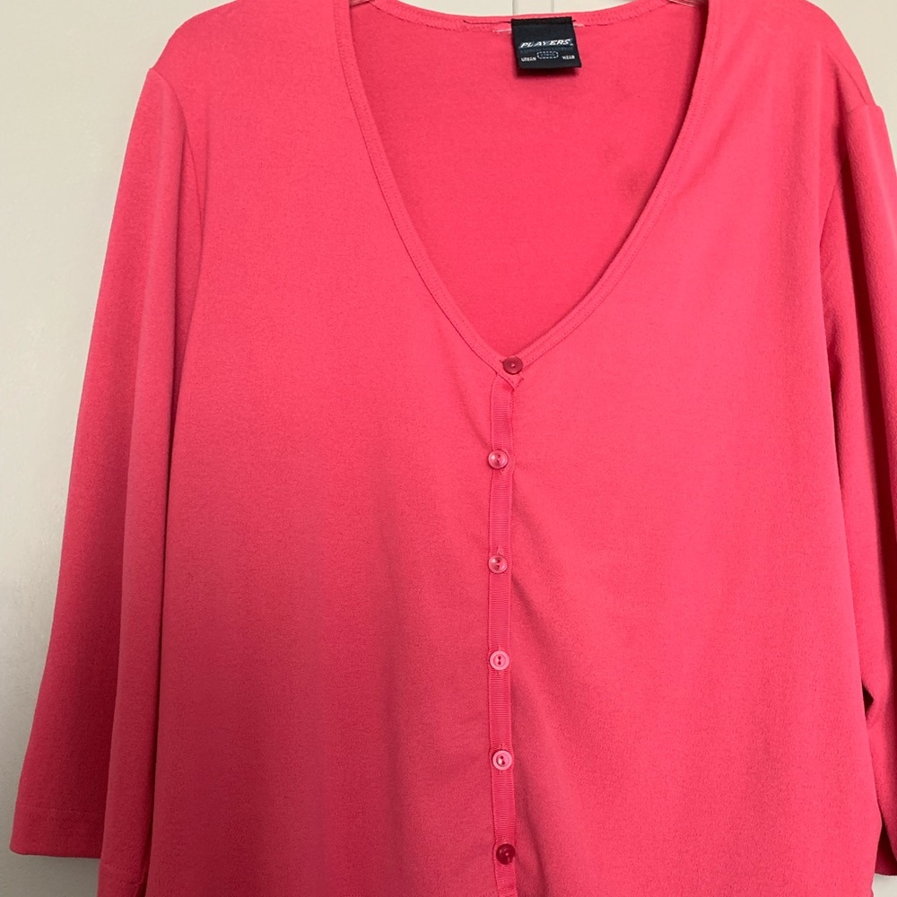 A pink sweater